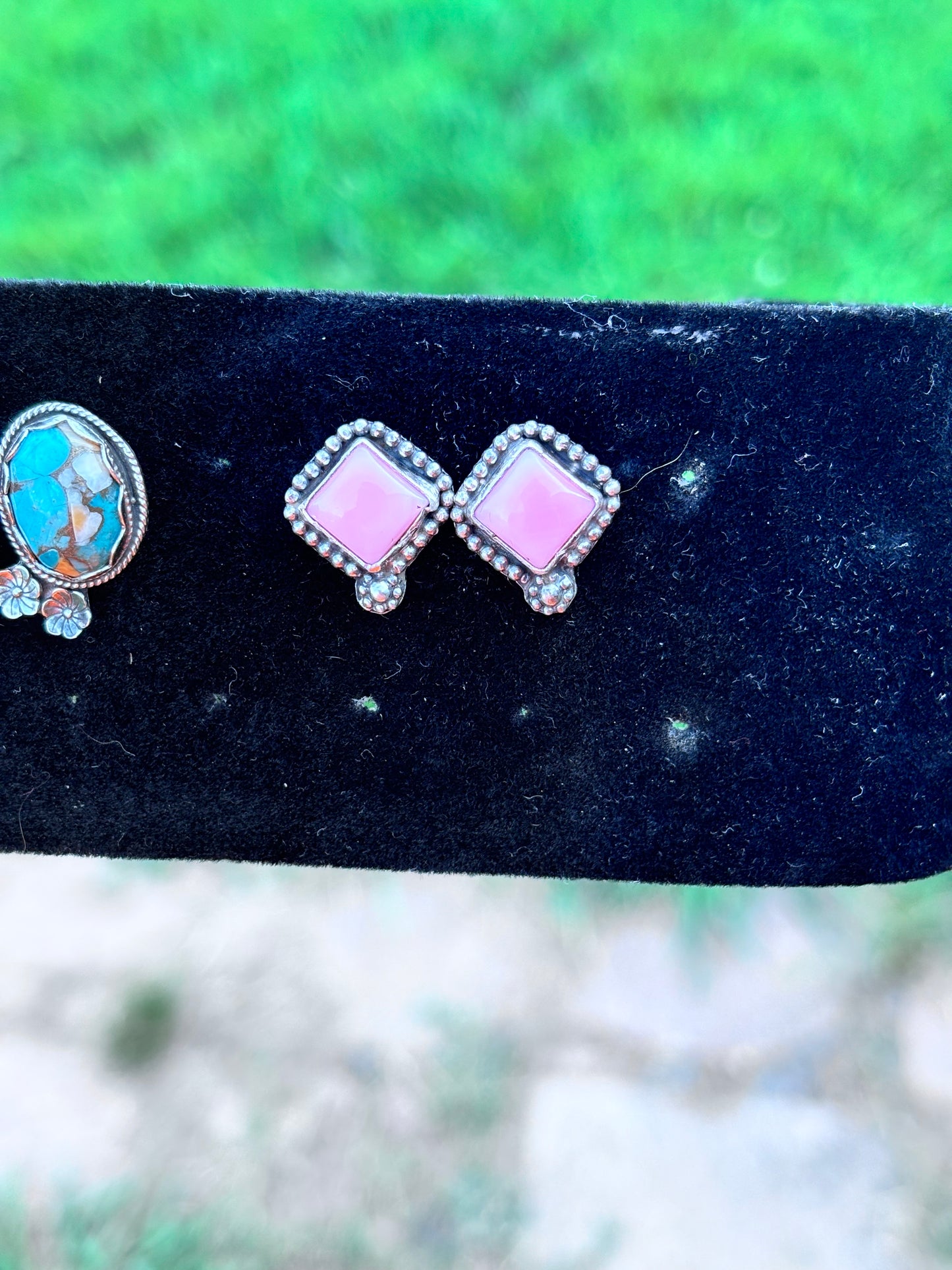 Pink conch studs
