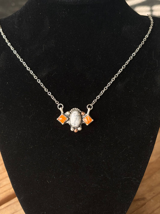 Lauren’s custom Vols necklace