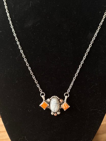 Lauren’s custom Vols necklace